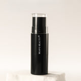 Black makeup bottle with 'Iravo Beauty' branding on a light background