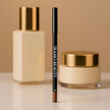 Irawo Beauty makeup products including a lip liner, bottle, and jar on a beige background