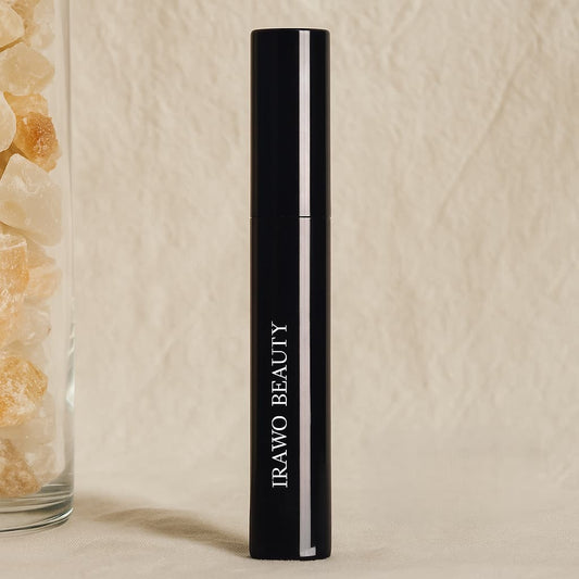 Black cosmetic tube with 'Irawo Beauty' branding on a beige background