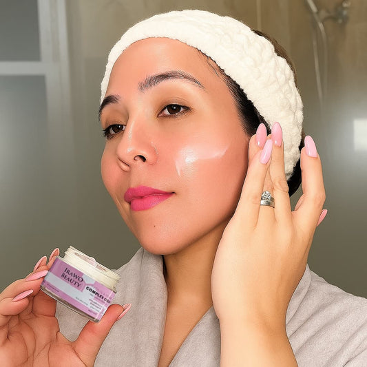 Woman applying cream to her face with a product labeled 'IRAWO BEAUTY' in the foreground.