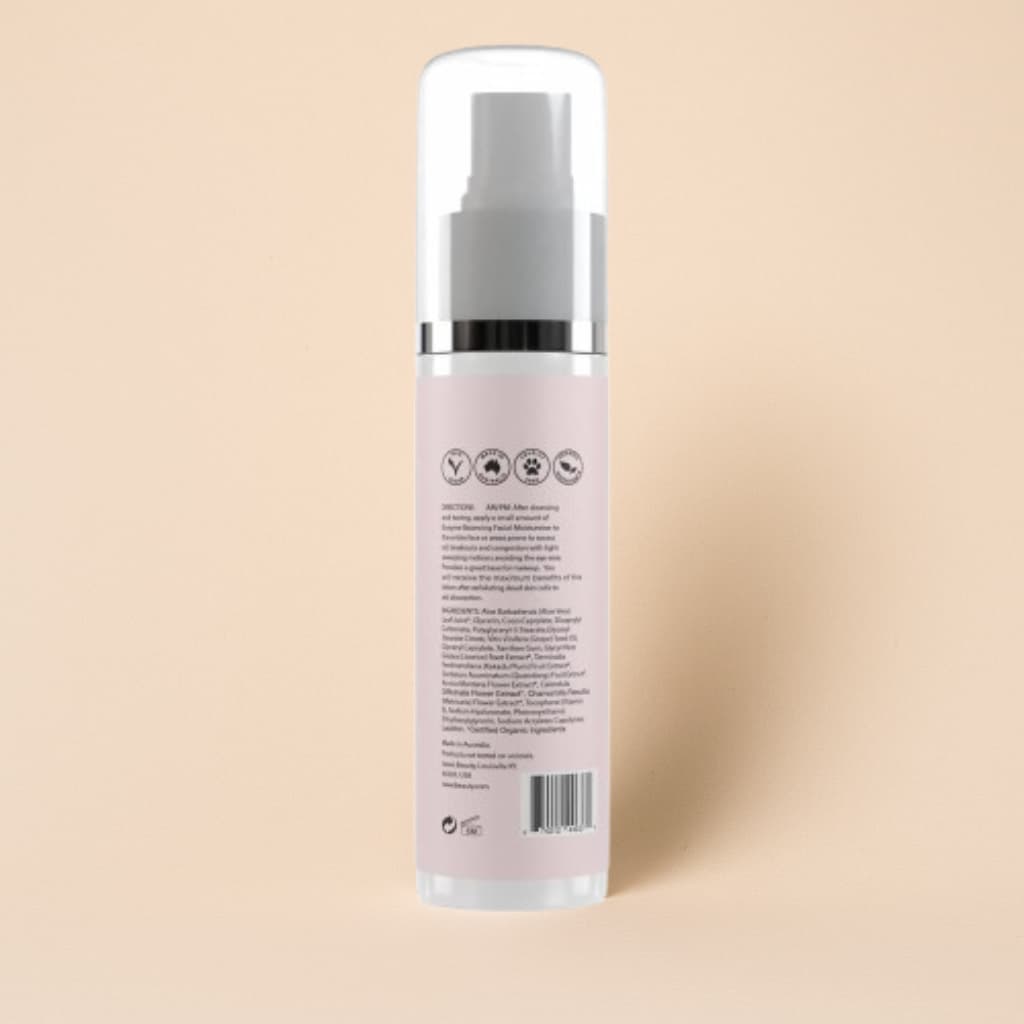 Skincare bottle with label on a beige background