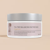 Jar of tea tree balancing enzyme mask on a beige background