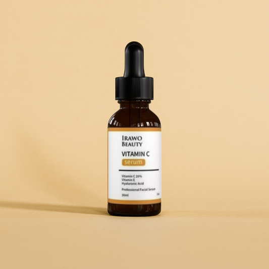 Irawo Beauty Vitamin C serum bottle with dropper on a beige background