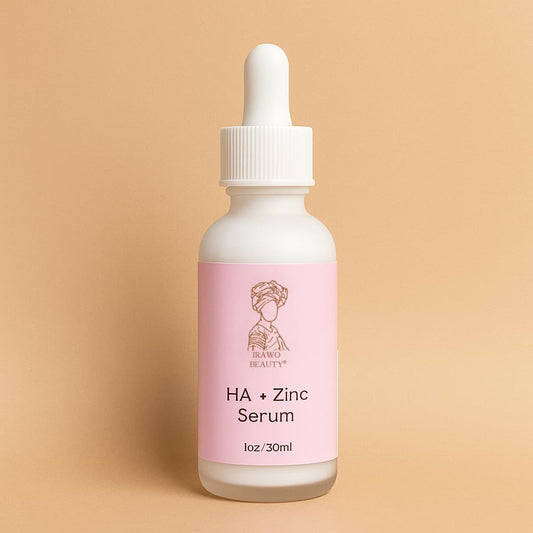 HA + Zinc Serum bottle with pink label on a beige background