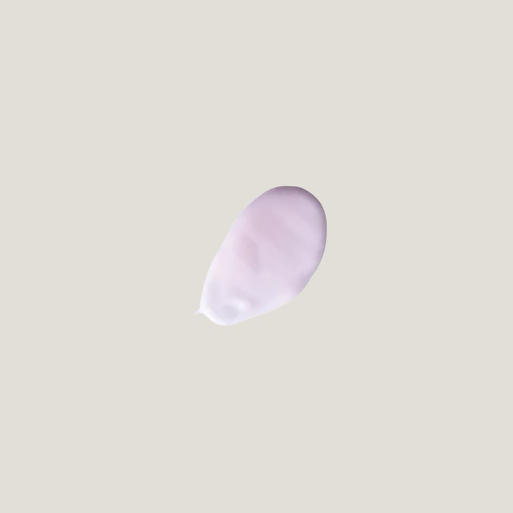 Purple teardrop-shaped object on a beige background