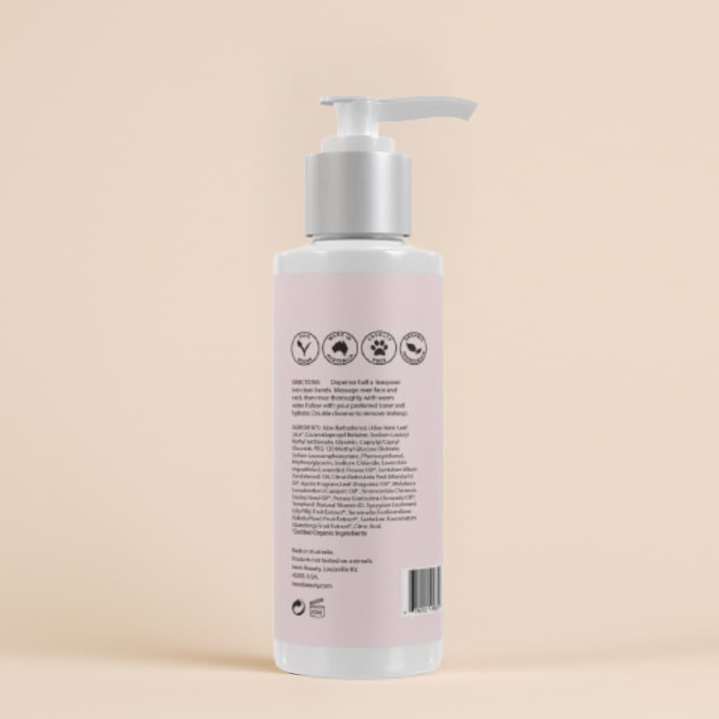 White bottle with pump on a beige background