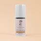 Eye serum bottle with a beige background